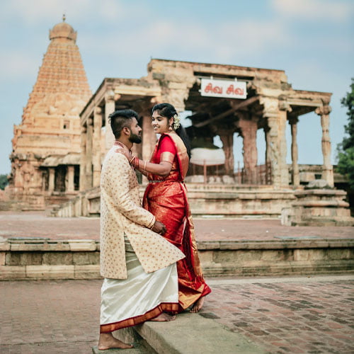 two couples immersed in romance amidst the scenic beauty of Tanjore.